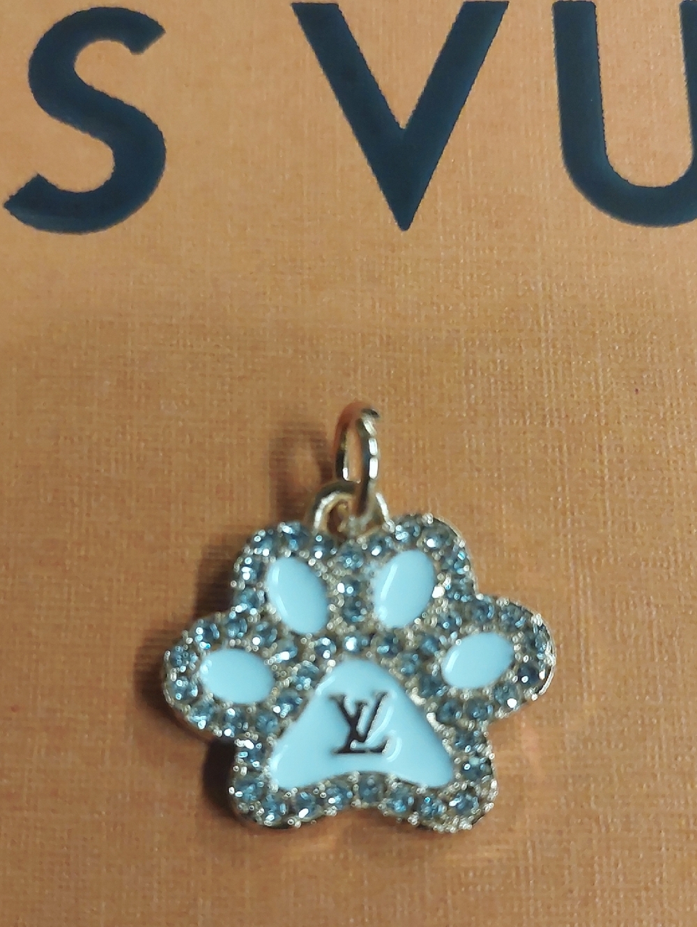 LV Gold-Tone Paw Charm Pendant with White Enamel & Crystals